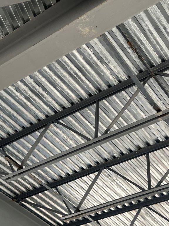 Saw cutting steel beam